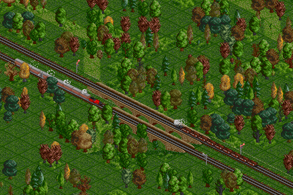 A high speed pacific passes a small coal train.