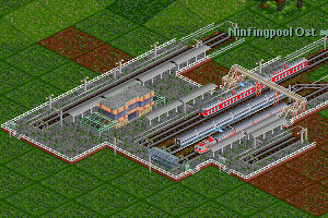 Modern-style station with an overpass and 3 buffer stops at tracks end.