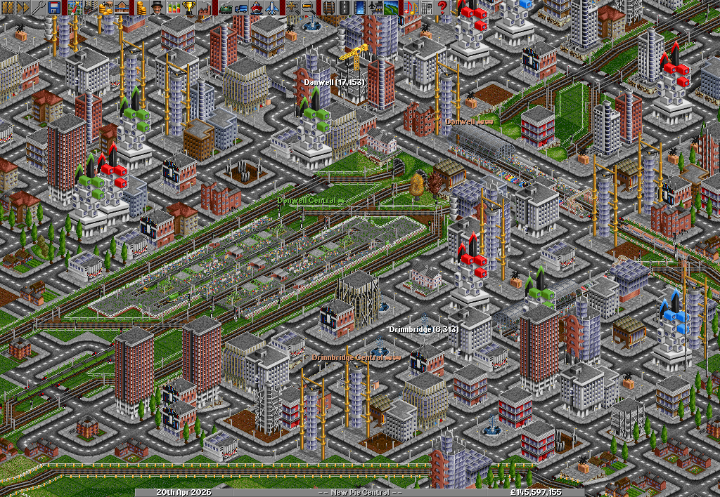 The Danwell Dancer pulls into Danwell station, which overlooks the sets of tunnels that lead out of and into my competitor's rather impressive, city-centre bi-directional terminus station.