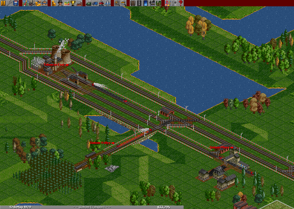 This screenie is of my main junction thingie. Most trains pass through here, and there are often little jams as trains wait for each other. The coal pickup station you see was my original train line.