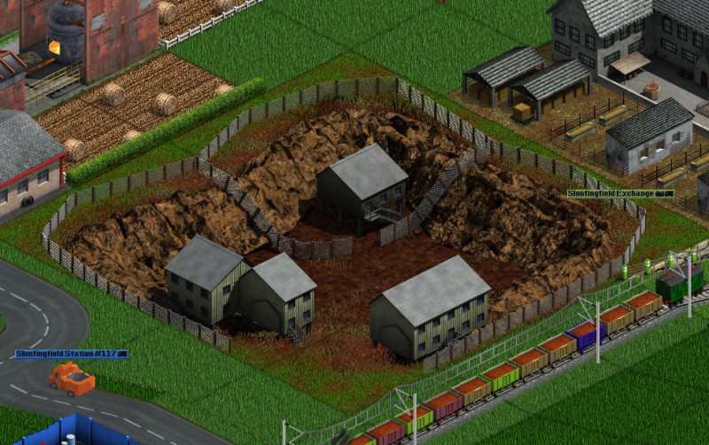 Screenshot with other industries and vehicles. The road vehicles are from eGRVTS and the train is from Spain set.