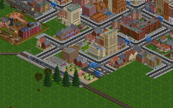 Three double deck buses in the bus terminal adjacent to the train station. Also seen is the VAST station tiles.