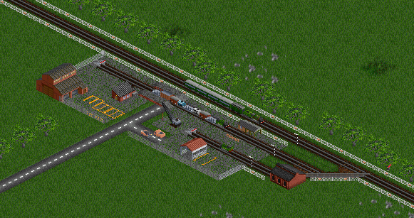 A passenger train with a NS3700 passes a small cargo station with a NS6200.