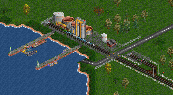 A tanker train with a NS3900 is halted at a terminus station with a dock.