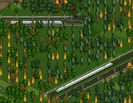 Although this part of the track has already been rebuilt, trains are still detoured. Here, an express train on the commuter track (left) passes an express train on its normal track (right).