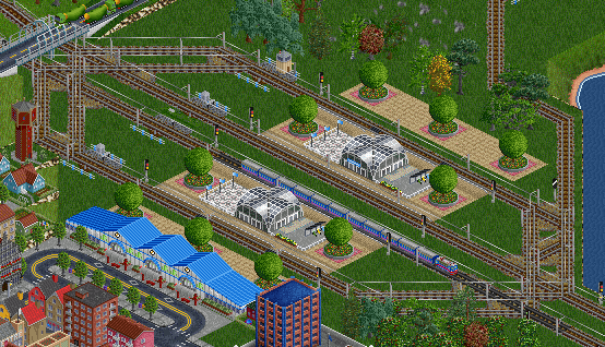 St Tropez is not a poor place in this game either - you can see that by the station which is a wild mix of Czech platforms, VAST, MTSS and the Japanese Stations set. A Swedish InterCity pulled by an Rc6 is speeding through St Tropez.