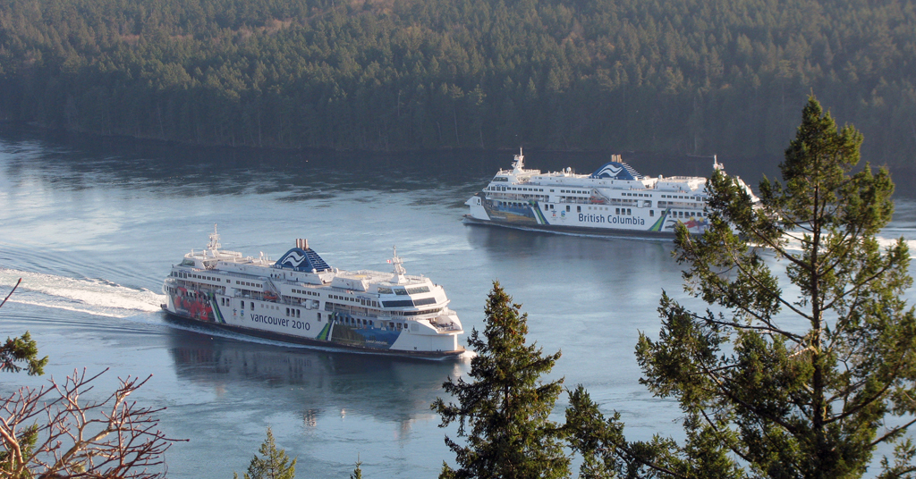 Coastal Celebration and Coastal Renaissance passing each other in Active Pass.