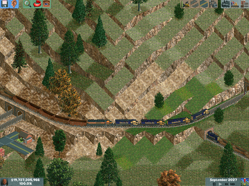 A long empty ore train climbing up the mountain