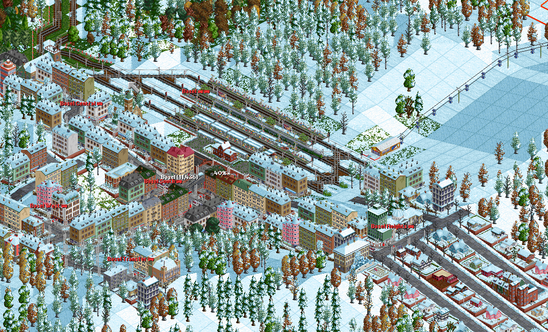 Snow reigns as an InterCity stops at the enlarged station at Basel.
