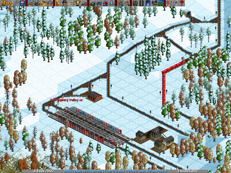 Having just exited from a small tunnel, the exit having been shrouded by trees, the gold-laden train rolls past Satfingburg coal mine, where a small, 6-wagon express coal train is waiting. There are many corners, but nothing a Centennial can't handle, and