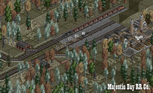 At the paper mill down in the valley, a much larger standard gauge 'Mountain' is waiting to load the mill's products.