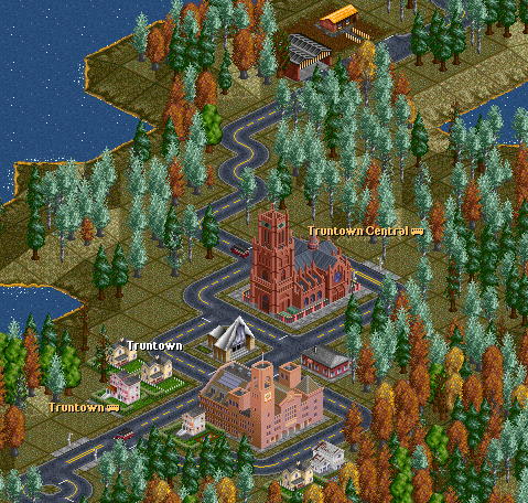 The town of Truntown, the largest town on the West island and our Company HQ.  One of the Mack C-14 buses can be seen as well.