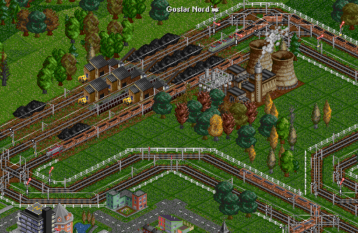 The coal unloading hub in the network. It is 9 squares long, and trains with up to 16 cars make use of that. That's about the longest trains that are still useful.