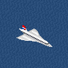 BA Concorde flying over open sea.