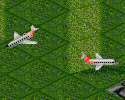 A pair of ERJ-145s flying past each other, with the rear-mounted twin engines clearly visible.