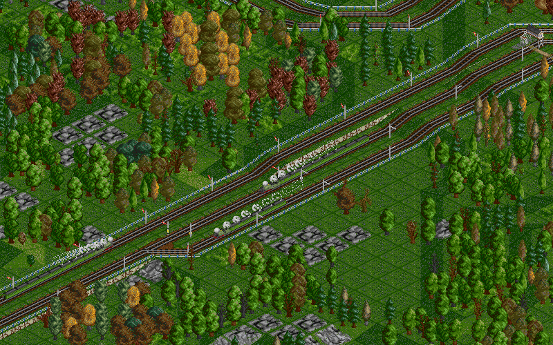 The introduction of a new 4-6-2 Pacific locomotive has led me to straighten up the tracks between Wennford and Fretfingbourne. A third track has been added for the slower 4-4-0s, and the priority signal system can be clearly seen here.