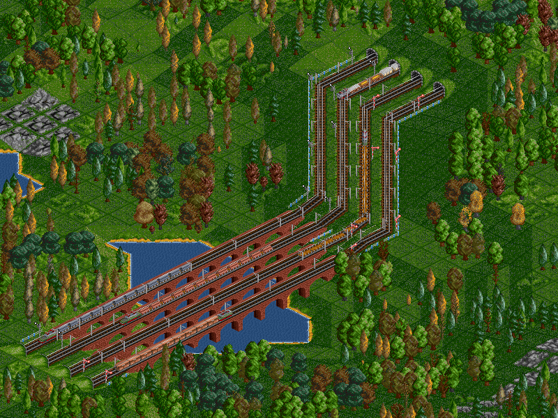The original pair of viaducts were meant for only 4 farm trains, but now that I've added 8 steel trains and 9 iron ore trains to the farm network, I had to build an extra pair of bridges and tunnels. It really does get this busy at times.