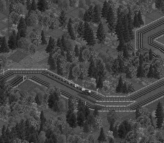 A 2-8-0 hauling empty livestock wagons up the grade near Radcliffe