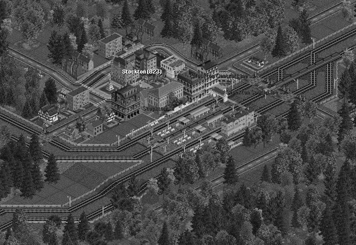 The expansion to the station at Stockton now seperates the busy northern trains from those headed south. A Pacific loads passengers while the Streamliner waits impatiently behind.