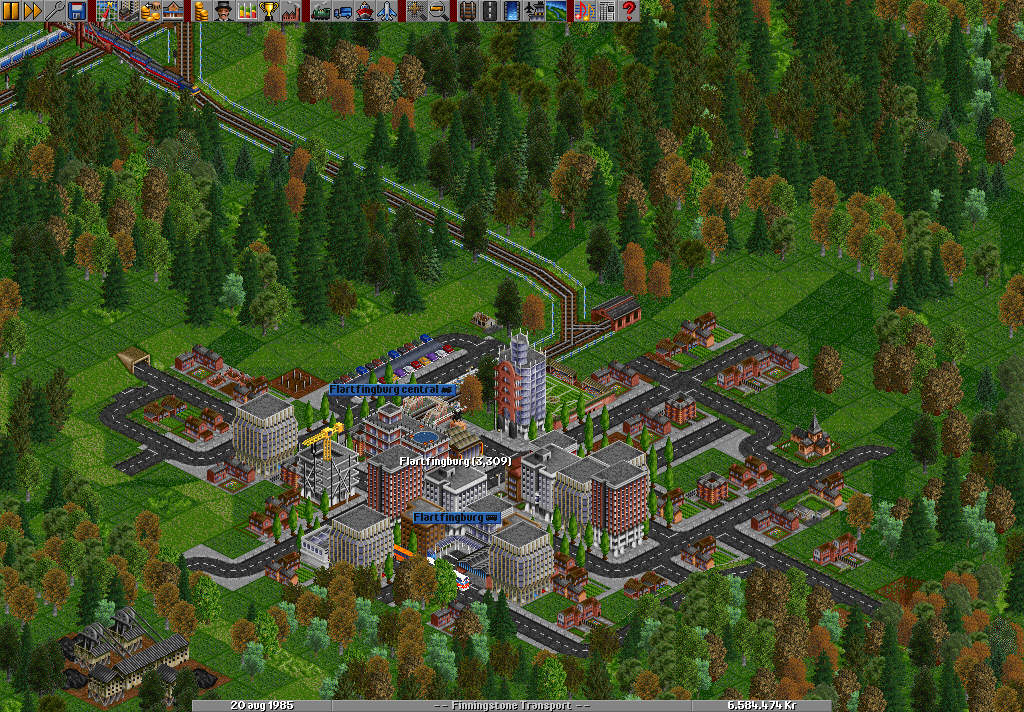 A town that recently started to grow and grow, and so a trainstation was added.