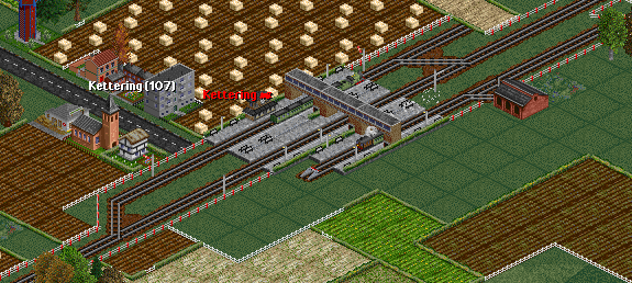 The mainline train, running early is forced to wait at Kettering for the late running branch service.