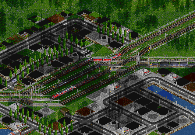 Two trains leave the station while one train is entering the station.