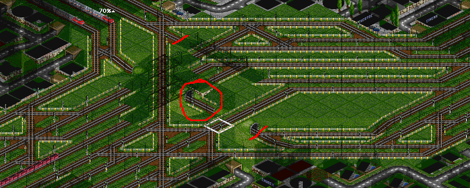 The red lines show where I miss the ability to put signals between tiles. I'd love to replace the encircled tile with a signal between tiles (between 2 tunnel entrances), as that would give me some more space there.