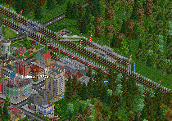 At Tonhorst we overhaul a local train pulled by a BR 140. The station is built to allow faster trains easy to pass. On the other side of the lake geography doesn't allow too big stations.