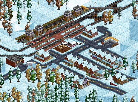 Coal train passing little town up in mountains.