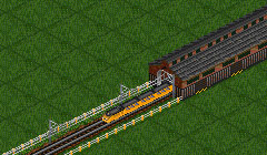 Long depot with train exiting